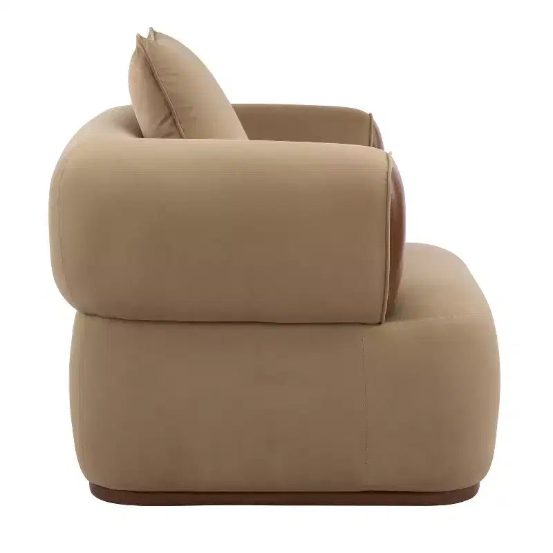 Poltrona di design moderna in velluto ed ecopelle con cuscino decorativo